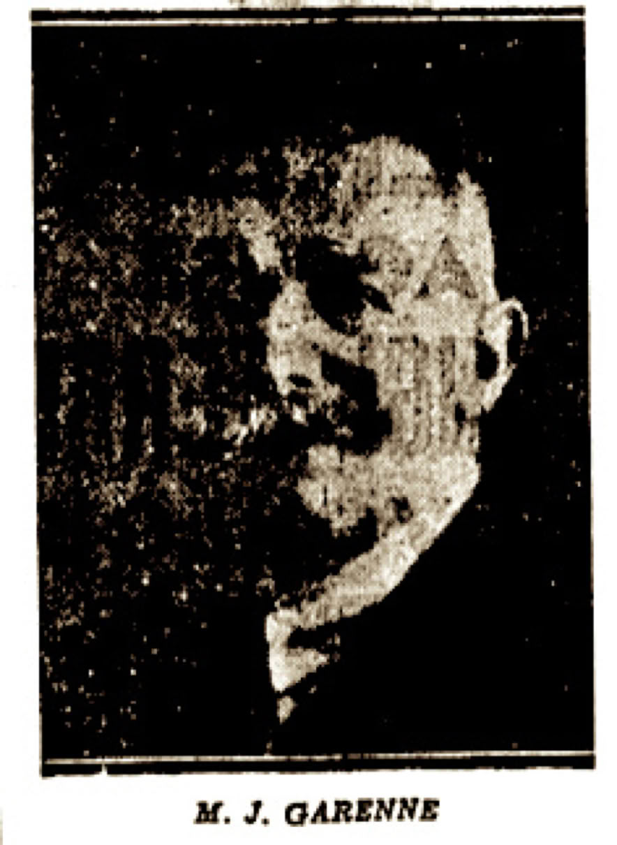 Portrait en noir et blanc de Jean -Louis Garenne avec une moustache, portant un costume sombre.